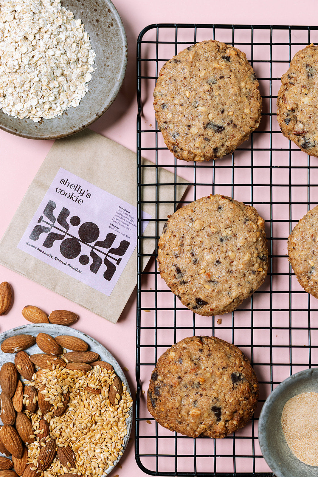 Lactation cookies beside a Shelly's cookie bag