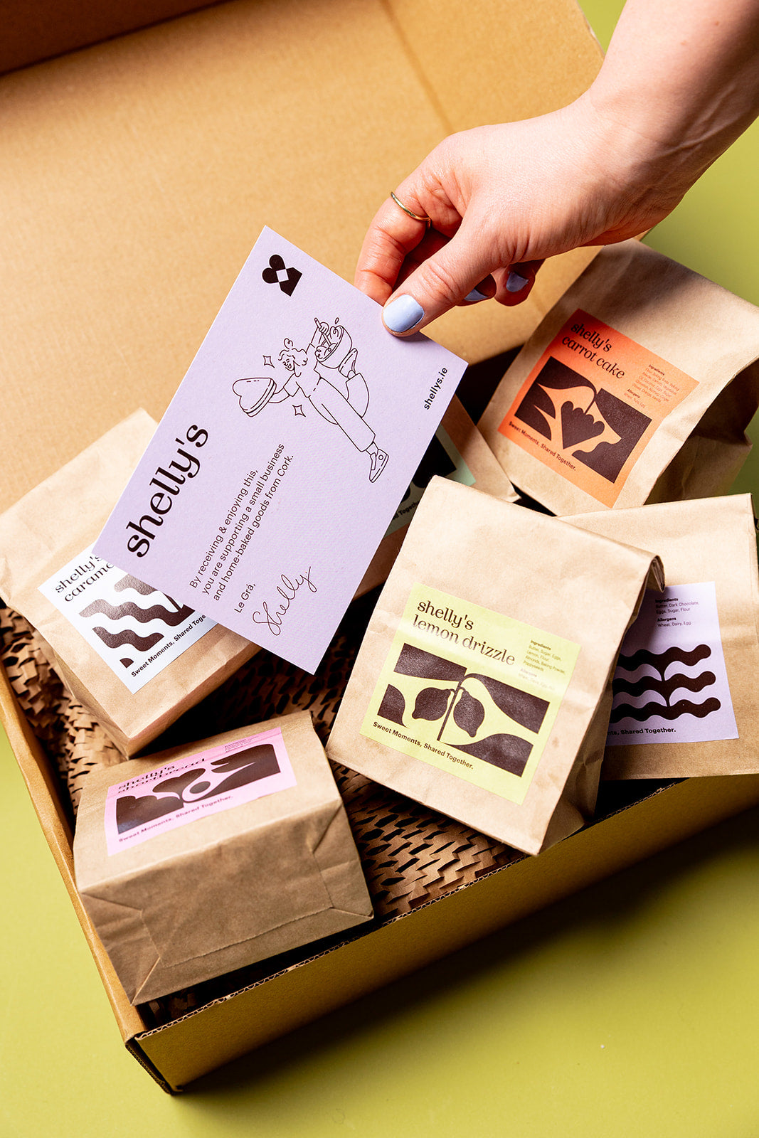 An open Delight in Every Bite treatbox